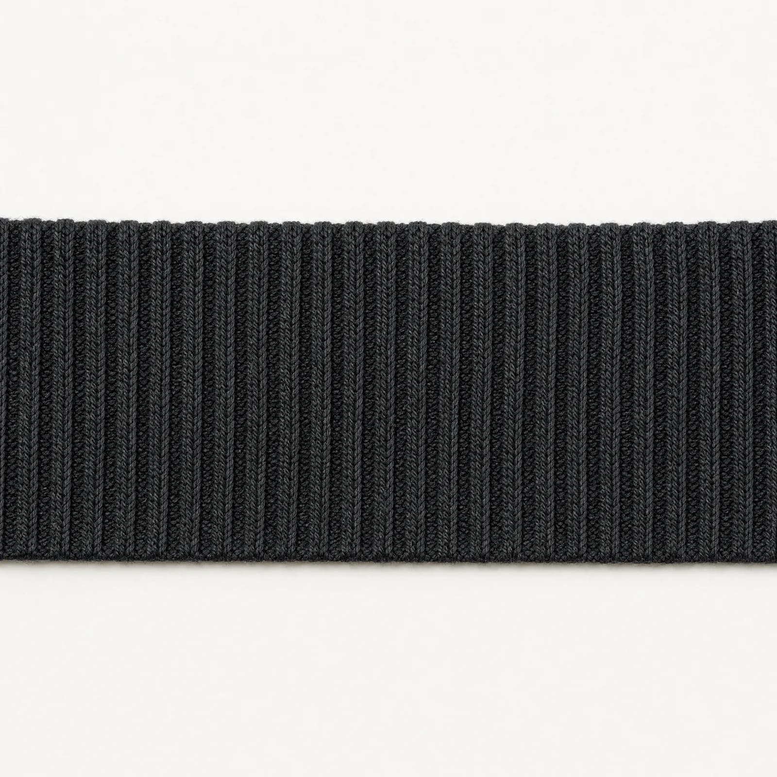 A graphite ribbed cuff band laid open flat so the full width of the band is visible edge to edge.